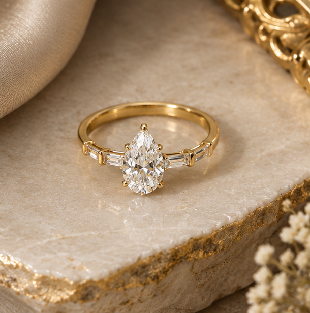 14k yellow pear cut solitaire basket ring 14k yellow pear cut solitaire basket ring