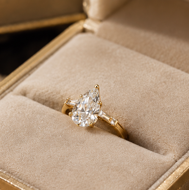 14k yellow pear cut solitaire basket ring